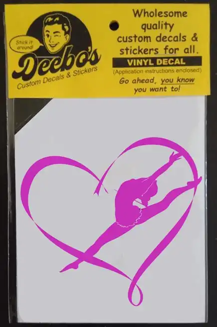 Ballerina pink silhouette dansing in a ribbon heart decal