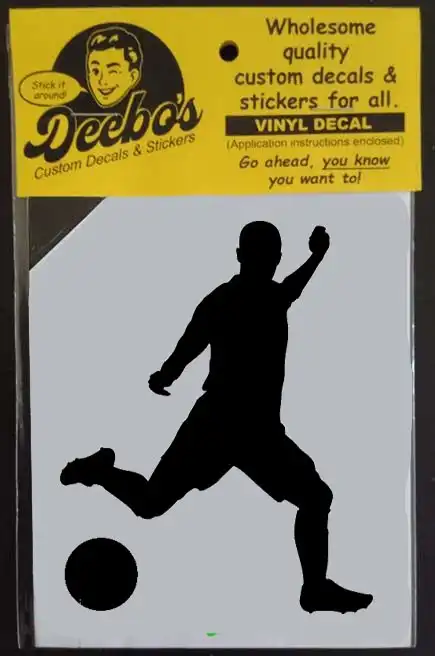 Soccer player silhouette running to kick a soccer ball