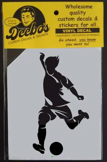 Soccer player running to score a goal decal