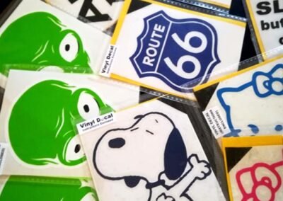 colourful decals including snoopy, aliens and route 66
